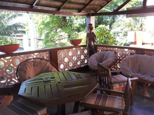 ระเบียง/ชานเรือน, Hotel Aurore Lome in โลเม