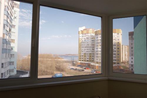 B&B Tsjerkasy - Двухкомнатная квартира с видом на Днепр в новом жилом комплексе! - Bed and Breakfast Tsjerkasy