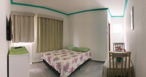 Suite com cozinha no quintal da casa in Parque Burle