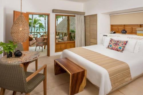 Ocean View King Bed room in Mahekal Beach Front Resort and Spa
