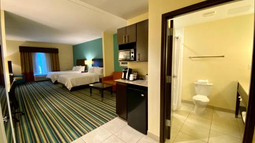 Queen Suite with Two Queen Beds and Sofa Bed