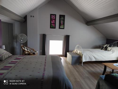 La mansarde aux digitales chambre d'hôte Ban-sur-Meurthe-Clefcy