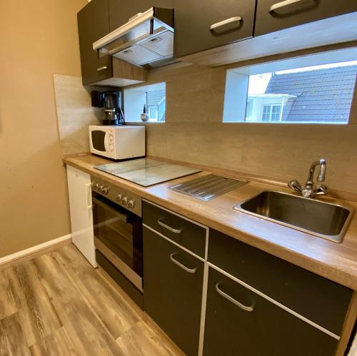 Konyha, Wilsmann Apartmentvermietung in Hovelhof