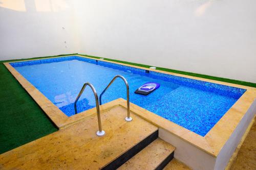 Swimming pool, De Lagom Comforts Goa in Goa