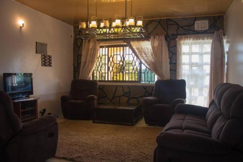 Közös társalgó / TV, Reens Vacation Rentals in Nakuru