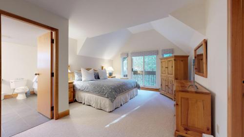 Lush Forest and Golf Course Views by Harmony Whistler in Whistler, Canada