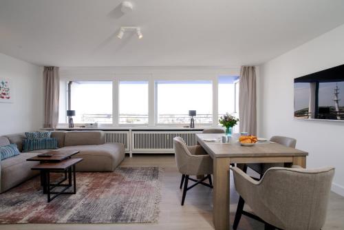 Ferienwohnung Sylter Welle mit kleinem Meerblick