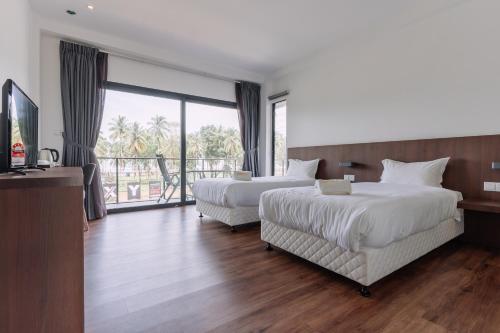 Roxy Sematan Villa & Townhouse Room Type - Deluxe King