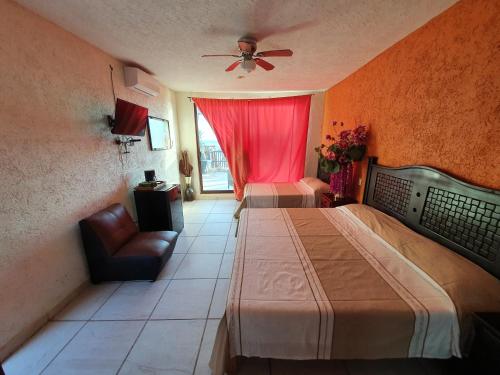 Bungalows La Perla Playa Azul in 藍色海灘-米卻肯