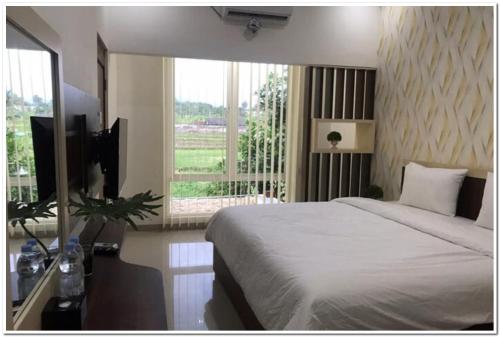 B&B Balong - RedDoorz Syariah at Omah Sawah - Bed and Breakfast Balong