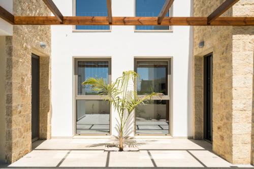 Beachfront Nymphes Aigli with Private Pool, Children Area & BBQ - Tap to explore photos