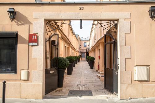 Hotel De L'Horloge - Hôtel - Paris