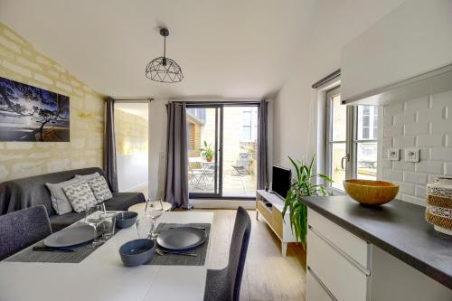 L'Insolite - Joli T2 en duplex avec Terrasse