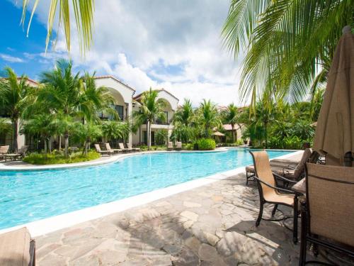 Nicely Decorated Ground-Floor Unit in Front of Pool at Pacifico in Coco