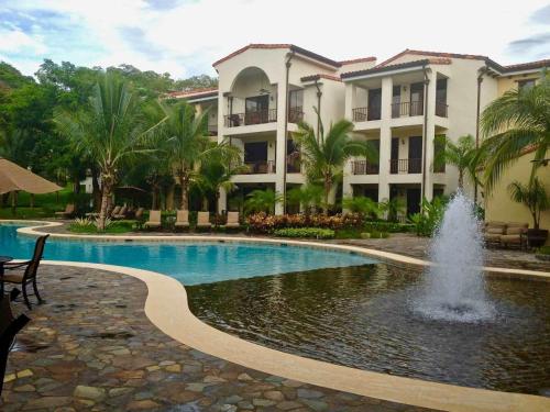 Nicely Decorated Ground-Floor Unit in Front of Pool at Pacifico in Coco