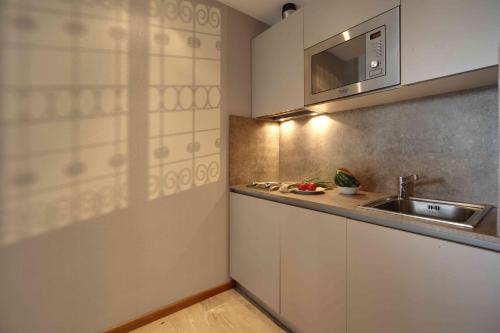 Monolocale con affaccio su parco Sempione - E23 - Contempora - main image