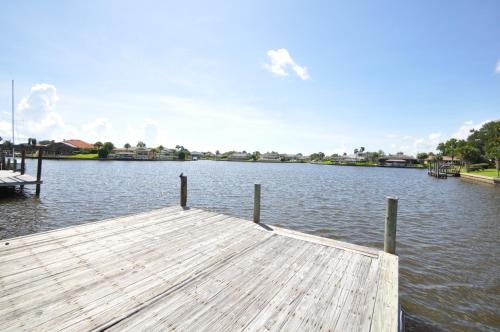 Sunset Bay Beautiful Pool Home - Bring Your Boat or Jet Ski - Canal with Dock- Sleeps 10 - 4 BD thumb 3