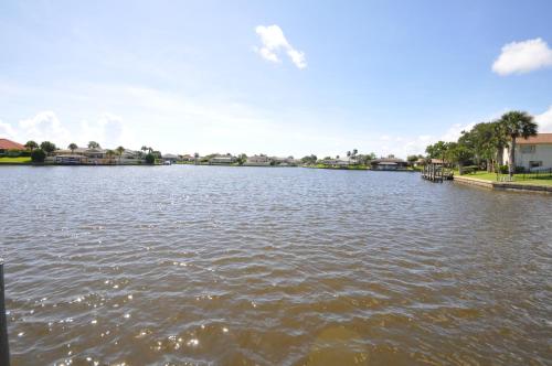 Sunset Bay Beautiful Pool Home - Bring Your Boat or Jet Ski - Canal with Dock- Sleeps 10 - 4 BD thumb 4