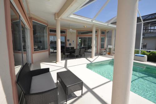 Sunset Bay Beautiful Pool Home - Bring Your Boat or Jet Ski - Canal with Dock- Sleeps 10 - 4 BD detail