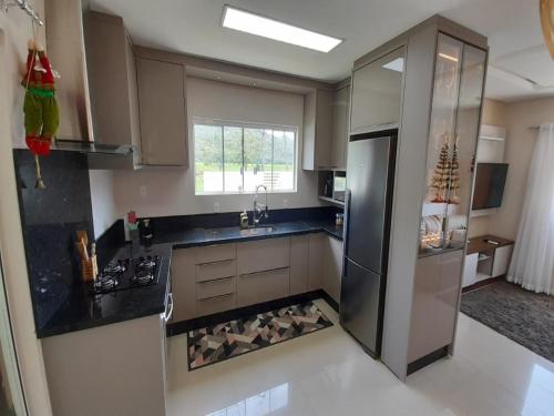 Casa de praia / campo próximo Balneário dos Açores (Casa de praia / campo proximo Balneario dos Acores) in อาร์มาเซา