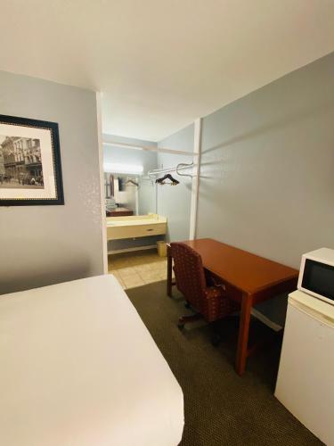 Travelers Place Inn & Suites - Tap to explore photos