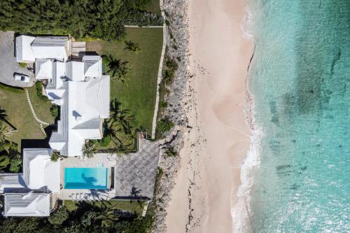 Coral Sea private beachfront panorama with infinity pool