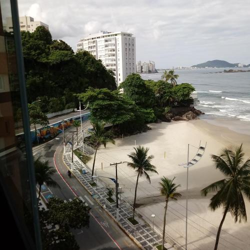 Apto frente praia Asturia Guaruja