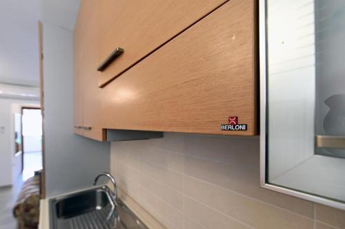 廚房, Casa Vacanza Via Roma in 聖焦爾焦約尼科