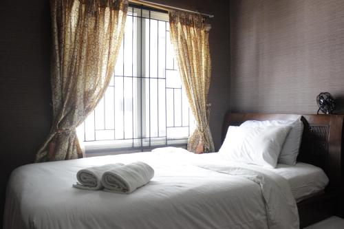 Two-Bedroom Apartment room in Chic and Cozy 2BR Apartment at Pinewood Jatinangor near JATOS By Travelio
