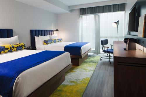 Standard Queen Room with Two Queen Beds and Mobility Accessible Roll-In Shower