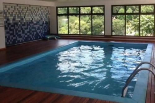 Apartamento charmoso com piscina