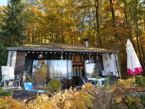 Holiday home with an Ardennian style, boasting a large terrace, located in Coo