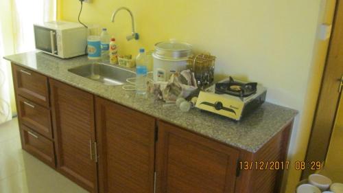 Room in Apartment - Indira Guest House Is In The Heart Of Flic En Flac