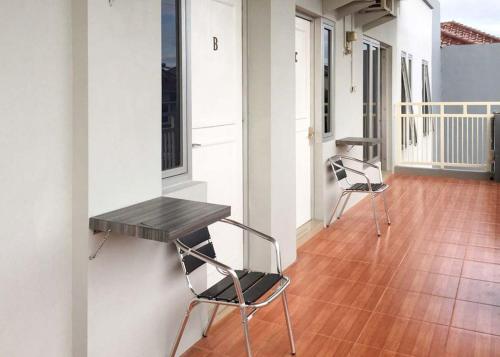 Eingang, RedDoorz @ Citraland Surabaya near Aquapark