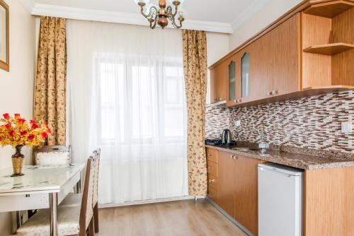 Camelot Apartment - image 7