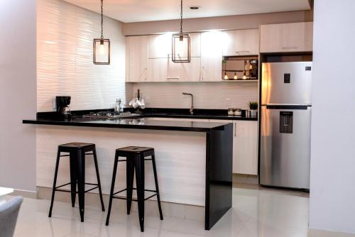 ¡Moderno Departamento a una sola cuadra de la Playa!