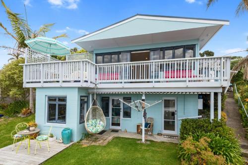 Waipu Cove Palm Cottage - Waipu Cove Holiday Home photo 1