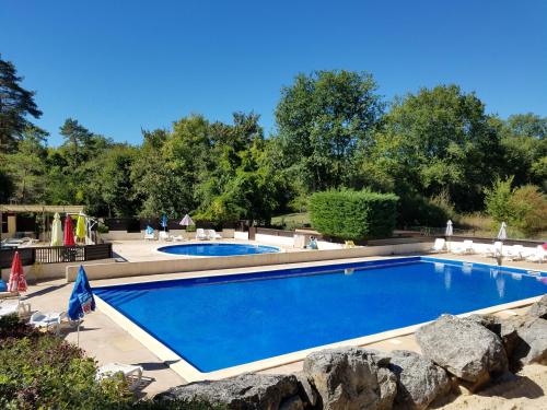Bazén, Camping les Tourterelles Chalets et mobilhomes in Hautefort