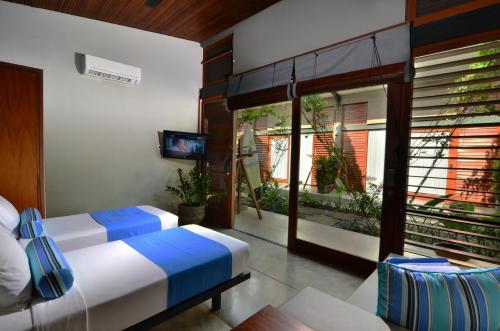 Guestroom, Hotel Komune and Beach Club Bali in Keramas