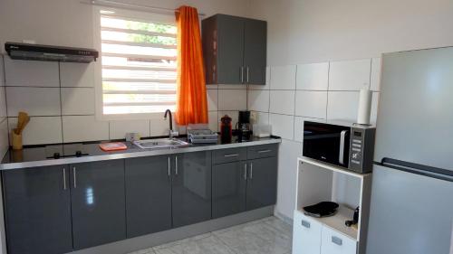 Kitchen, Appartement cosy a Deshaies avec piscine partagee, 46 m² in Deshaies
