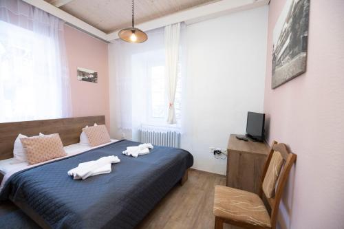Quadruple Room with Private Bathroom