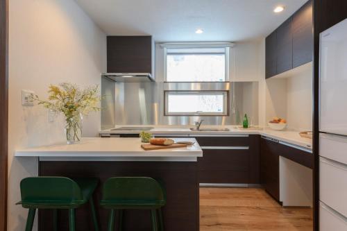 Kitchen, SnowDog Village in Niseko Village