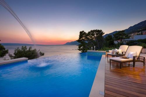 Luxury Seafront Villa Brela Pride with private heated pool at the beach in Brela - Baska Voda