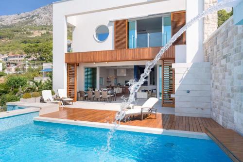 Luxury Seafront Villa Brela Pride with private heated pool at the beach in Brela - Baska Voda