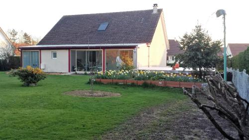 2 chambres privées dans un jardin d'hiver, garage voiture, vélos, motos