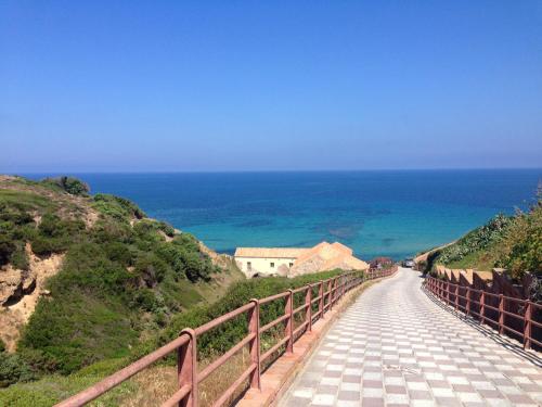 House with 2 bedrooms in Gonnesa with wonderful sea view and furnished terrace 20 m from the beach - image 5