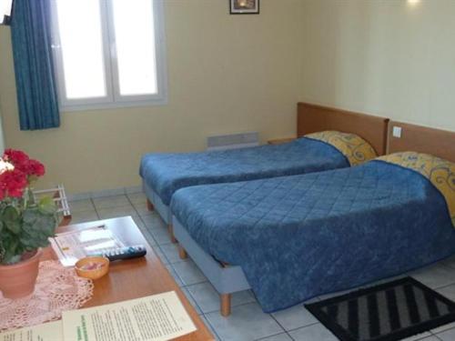 Chambre avec 2 lits