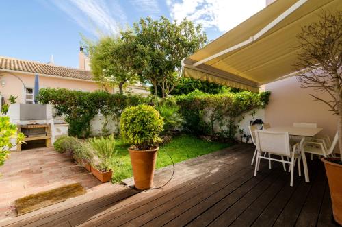 3 bedrooms house with shared pool enclosed garden and wifi at Vilamoura 3 km away from the beach