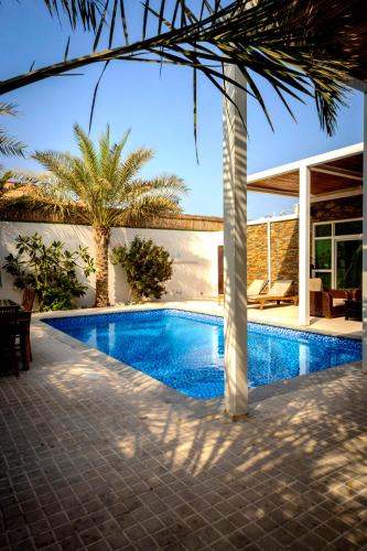 Dar 66 Pool Chalets with Jacuzzi