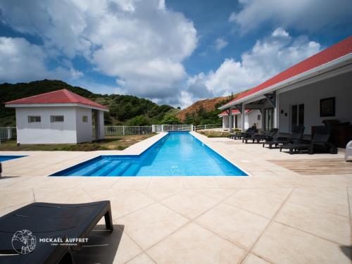 Grande villa avec piscine et jacuzzi - Location, gîte - Terre-de-Haut